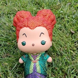 Colorful Beaded Figurine with Red Hair